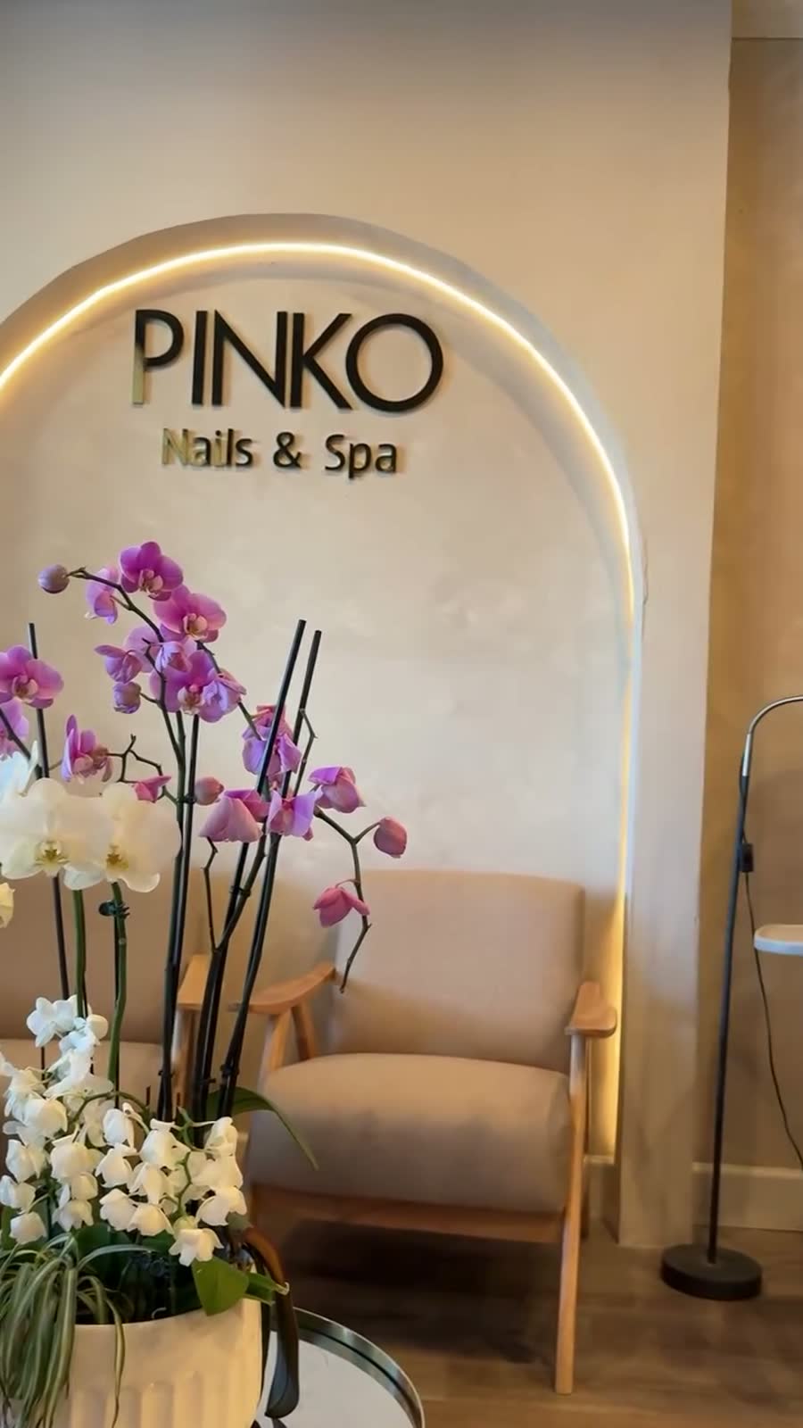 Orchid arrangement at the Pinko arch