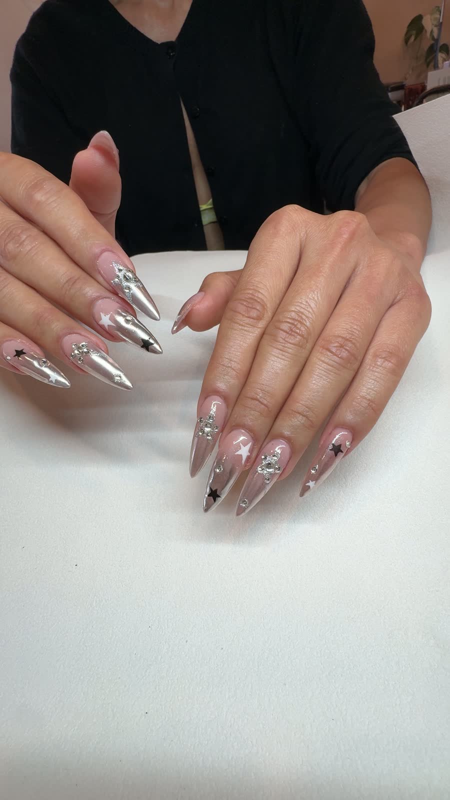 Chrome stiletto nails with stars