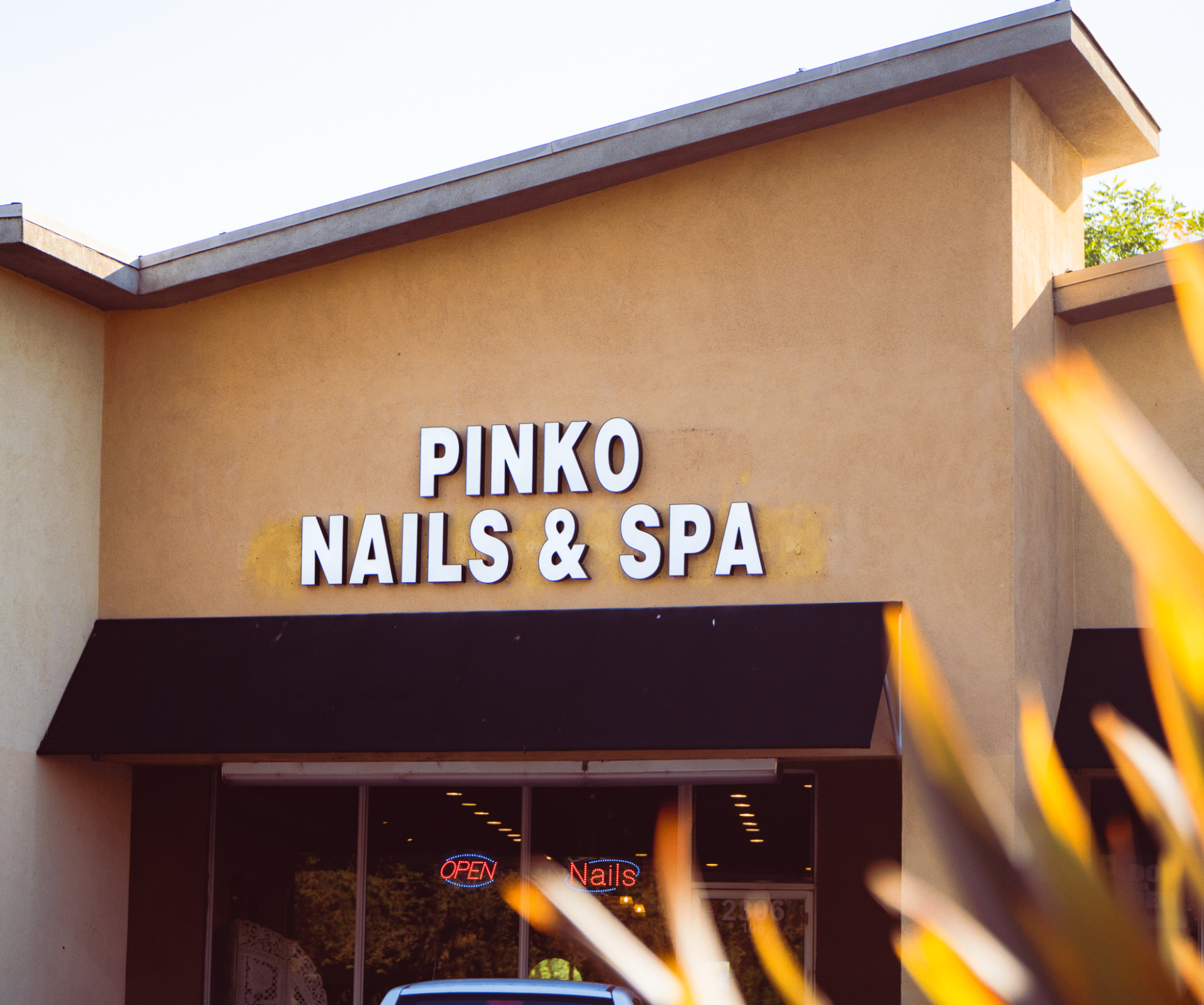Pinko Nails & Spa storefront in San Jose at golden hour